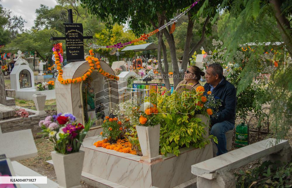 People Visit Cemeteries on the Day of the Dead - Mexico