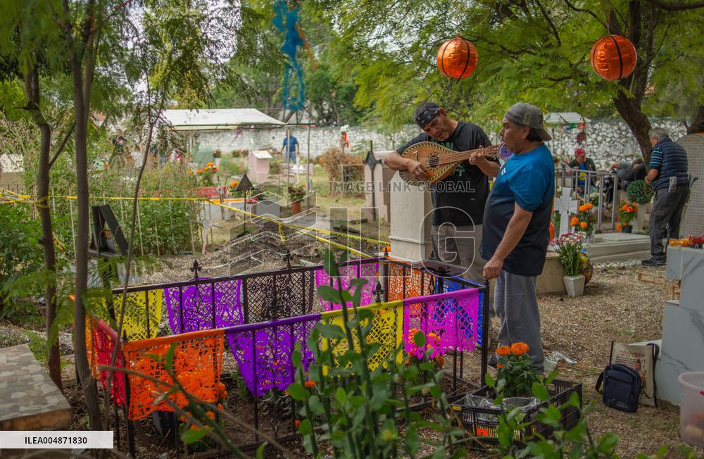 People Visit Cemeteries on the Day of the Dead - Mexico