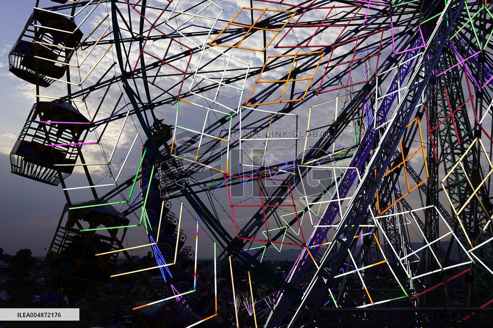 Illustration - Illuminated View Of Swings - Pushkar