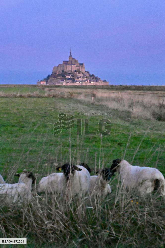 Mont-Saint-Michel and its bay in northwestern France. FC