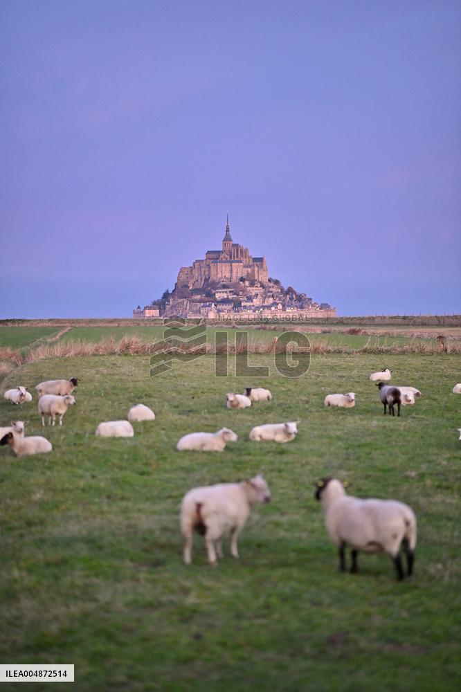 Mont-Saint-Michel and its bay in northwestern France. FC