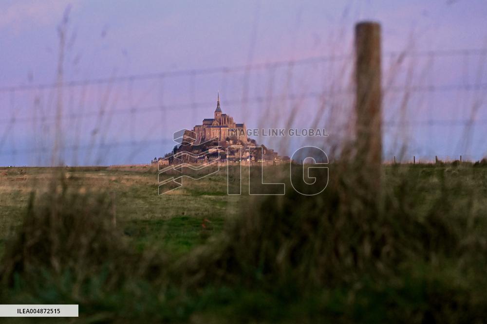 Mont-Saint-Michel and its bay in northwestern France. FC