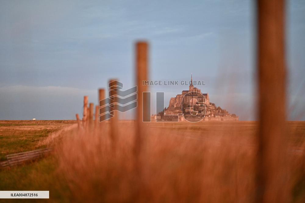 Mont-Saint-Michel and its bay in northwestern France. FC
