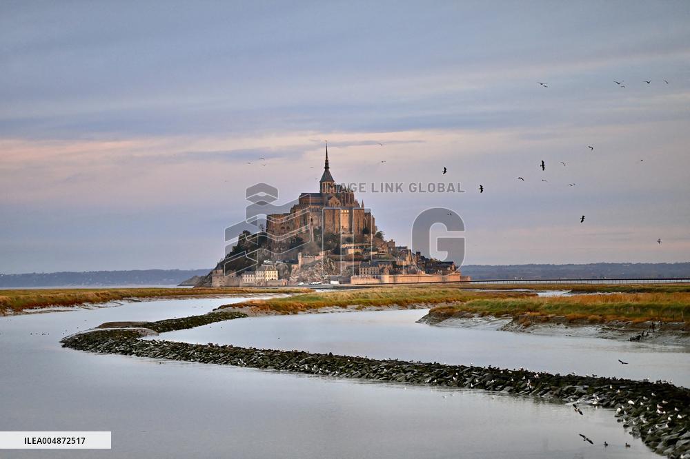 Mont-Saint-Michel and its bay in northwestern France. FC