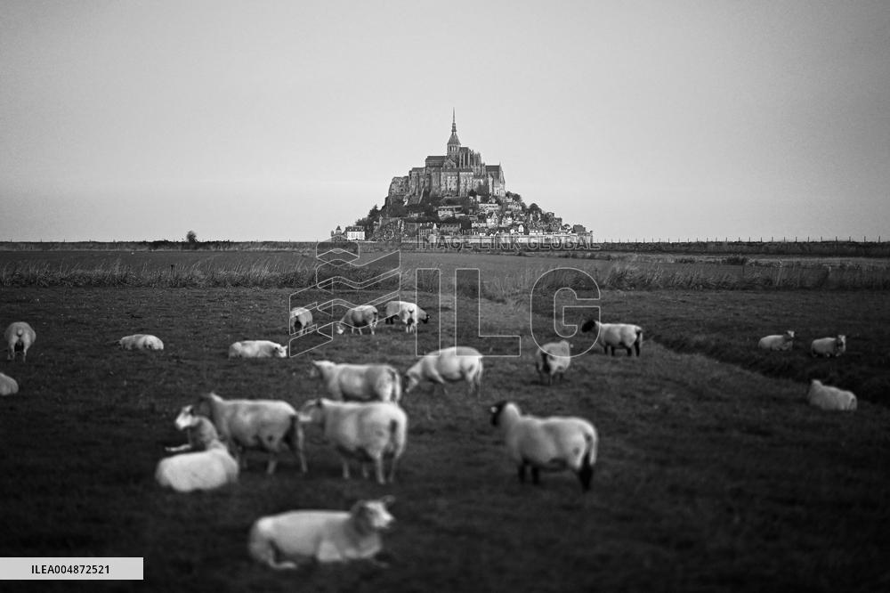 Mont-Saint-Michel and its bay in northwestern France. FC