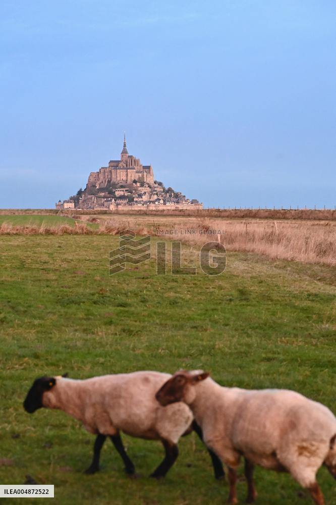 Mont-Saint-Michel and its bay in northwestern France. FC