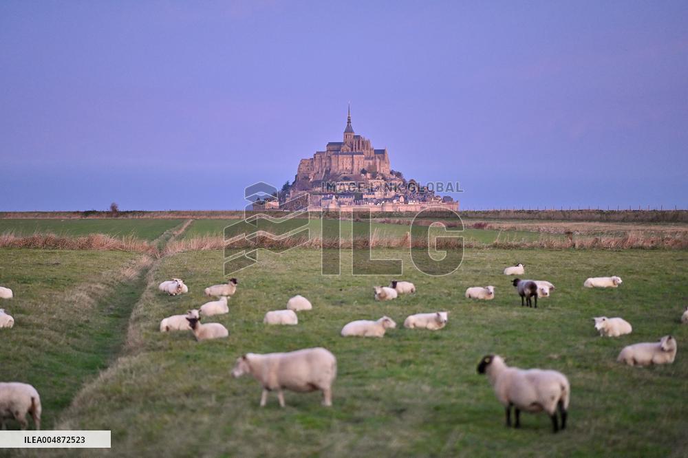 Mont-Saint-Michel and its bay in northwestern France. FC