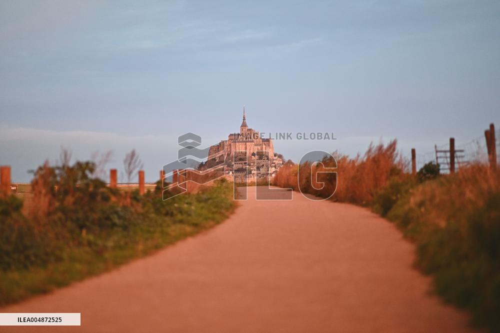 Mont-Saint-Michel and its bay in northwestern France. FC
