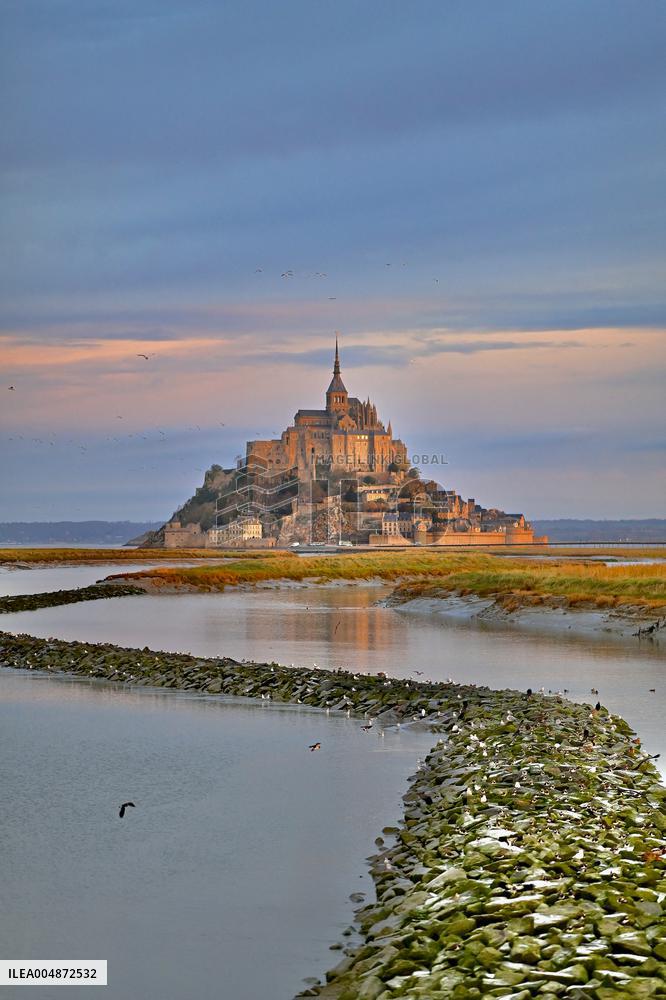Mont-Saint-Michel and its bay in northwestern France. FC