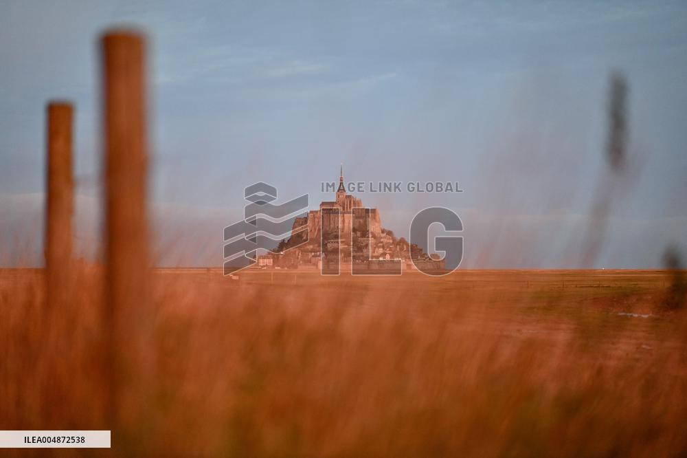 Mont-Saint-Michel and its bay in northwestern France. FC