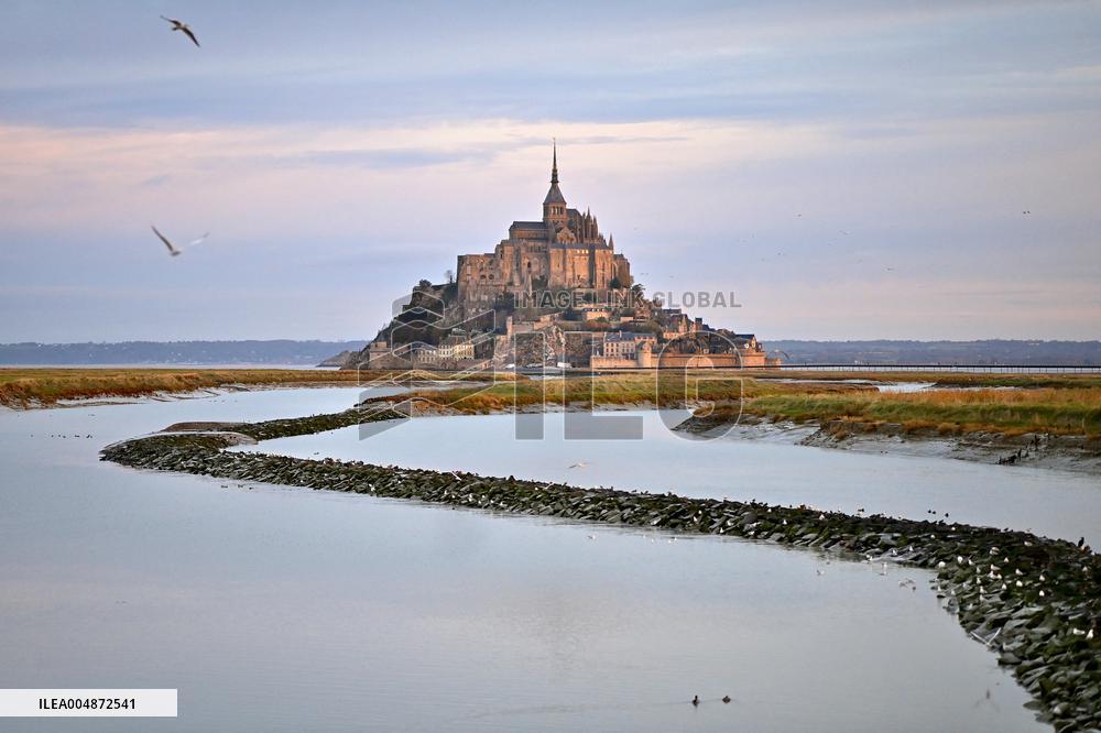 Mont-Saint-Michel and its bay in northwestern France. FC