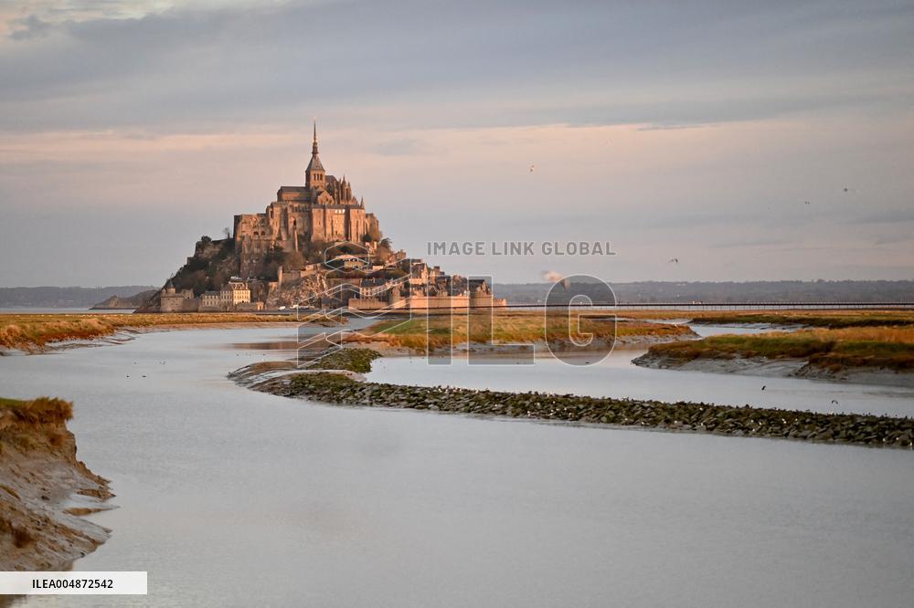 Mont-Saint-Michel and its bay in northwestern France. FC