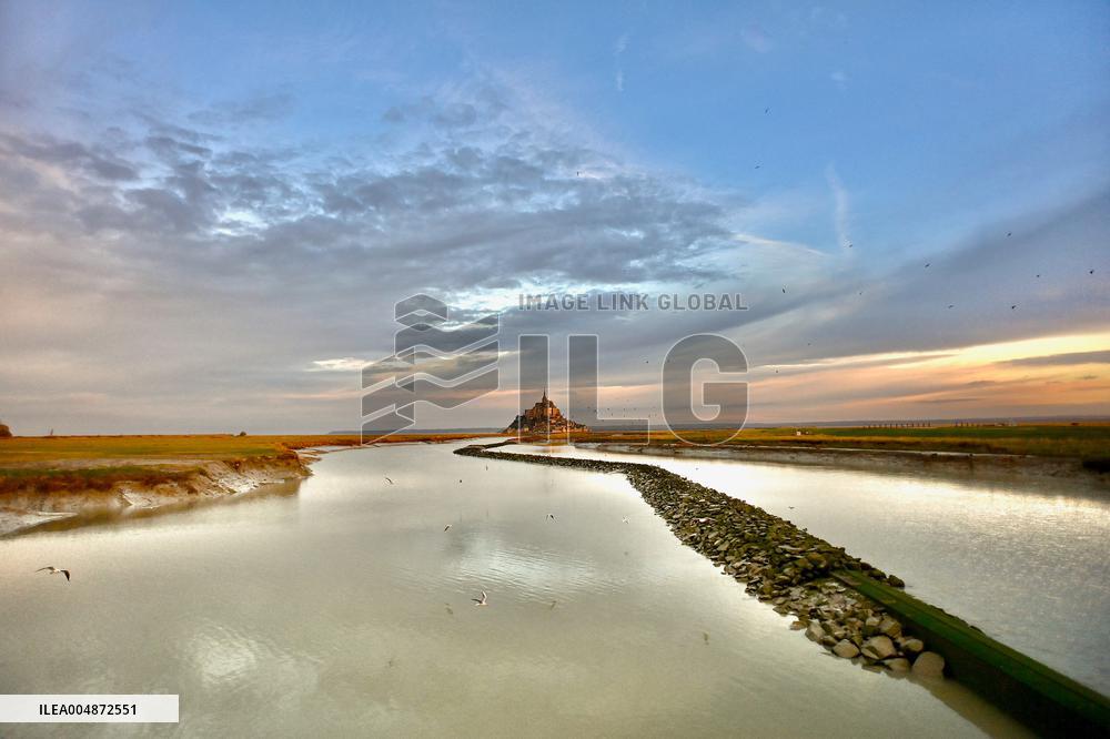Mont-Saint-Michel and its bay in northwestern France. FC