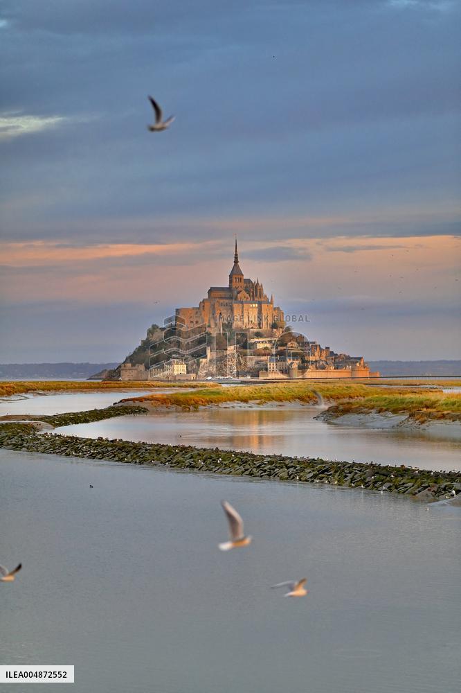 Mont-Saint-Michel and its bay in northwestern France. FC