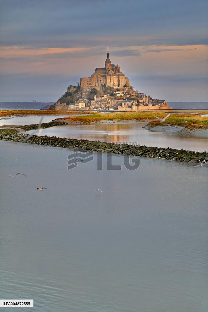 Mont-Saint-Michel and its bay in northwestern France. FC
