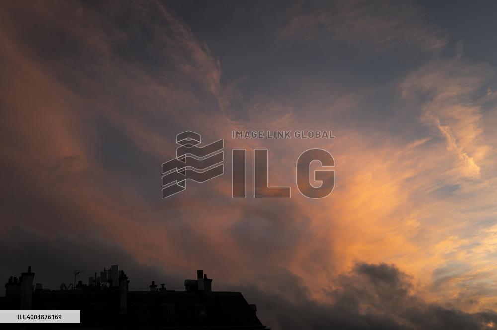 Sunset Over the Rooftops of Residential Buildings - Paris
