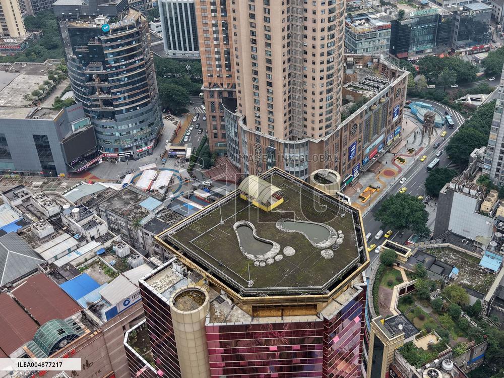 Giant Footprints on Building Rooftop in Chongqing