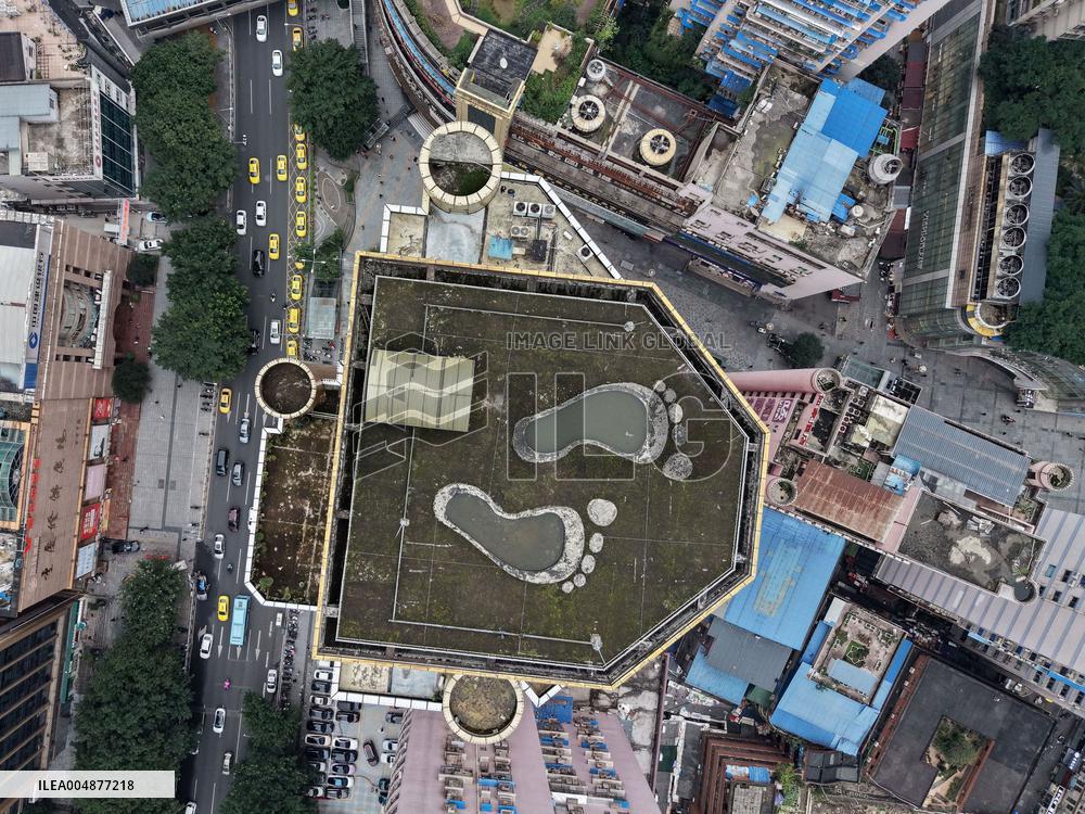 Giant Footprints on Building Rooftop in Chongqing