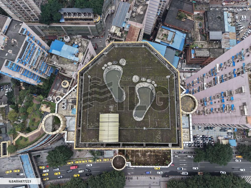 Giant Footprints on Building Rooftop in Chongqing