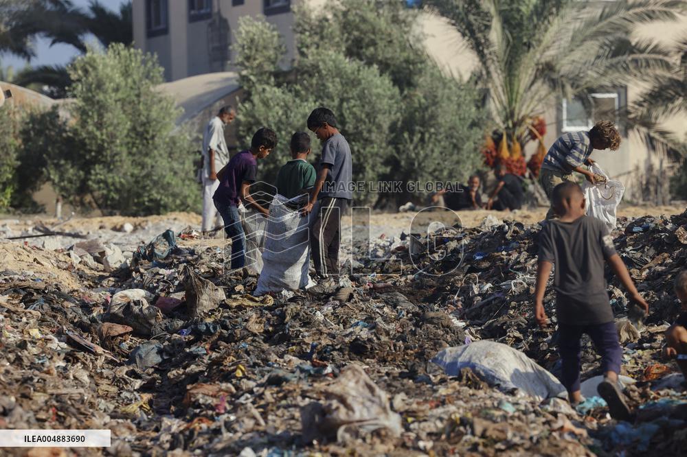 Gaza Scrap Search Amid Crisis