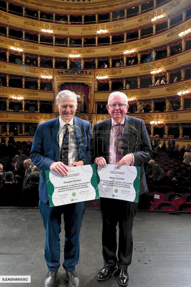 Mark Caulfield and Douglas F. Easton Receiving "Lombardy is Research" Award - Milan