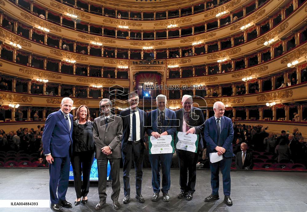 Mark Caulfield and Douglas F. Easton Receiving "Lombardy is Research" Award - Milan