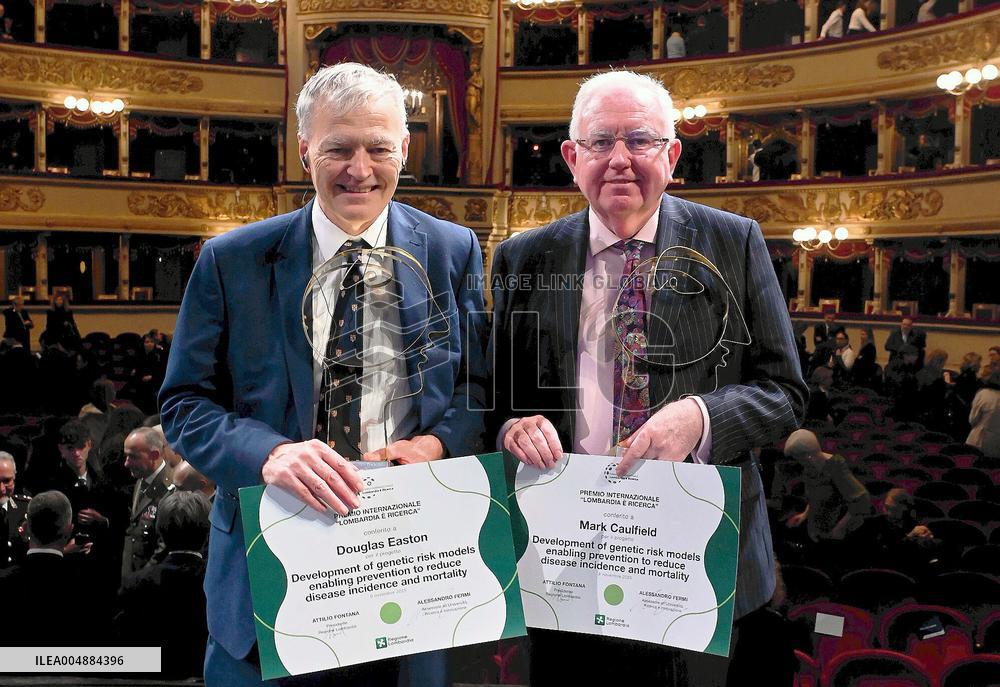 Mark Caulfield and Douglas F. Easton Receiving "Lombardy is Research" Award - Milan