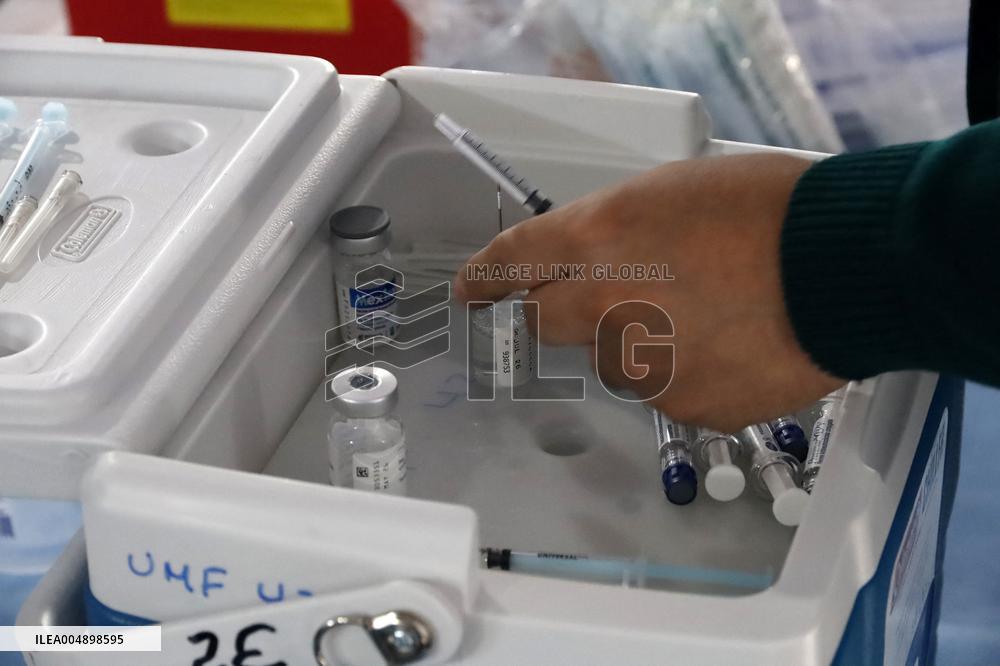 Vaccination Program Against Covid-19 and Influenza - Mexico City