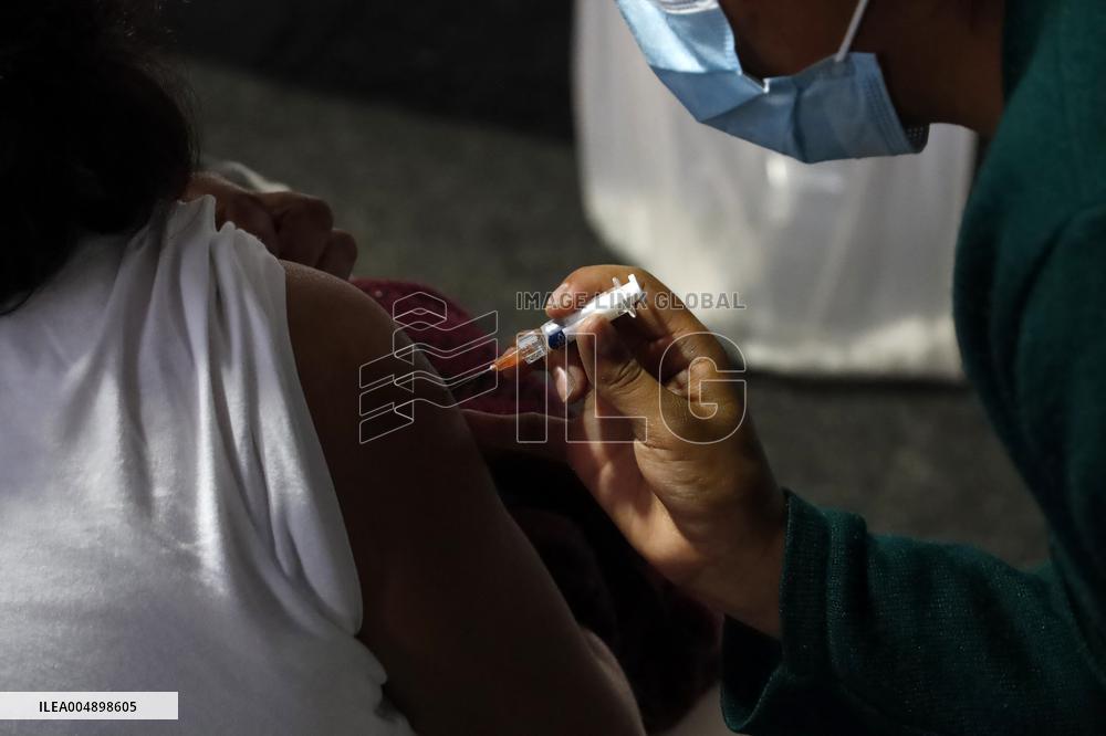Vaccination Program Against Covid-19 and Influenza - Mexico City
