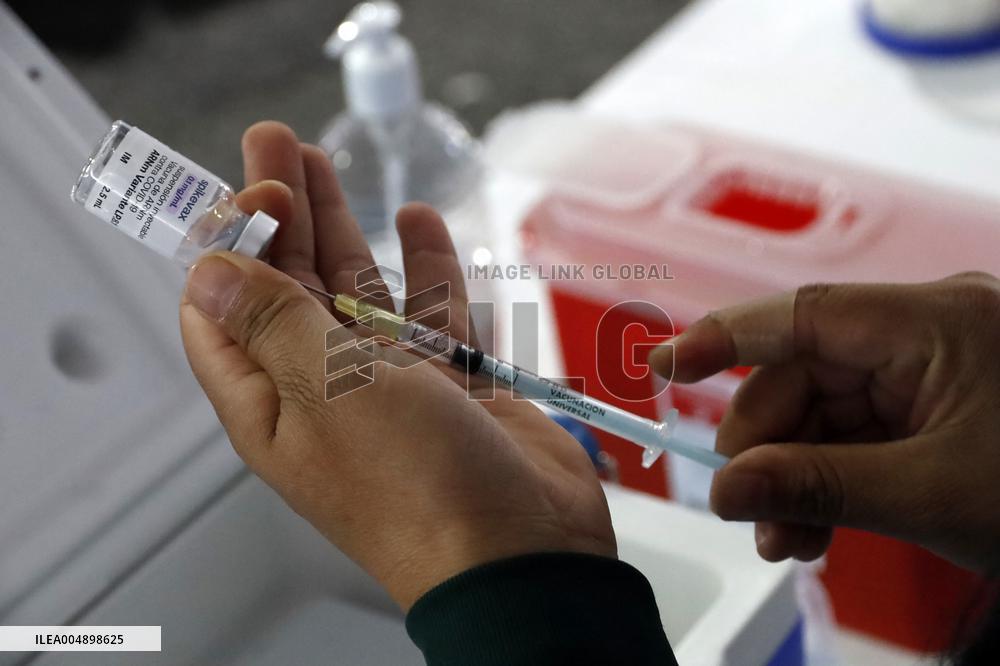 Vaccination Program Against Covid-19 and Influenza - Mexico City