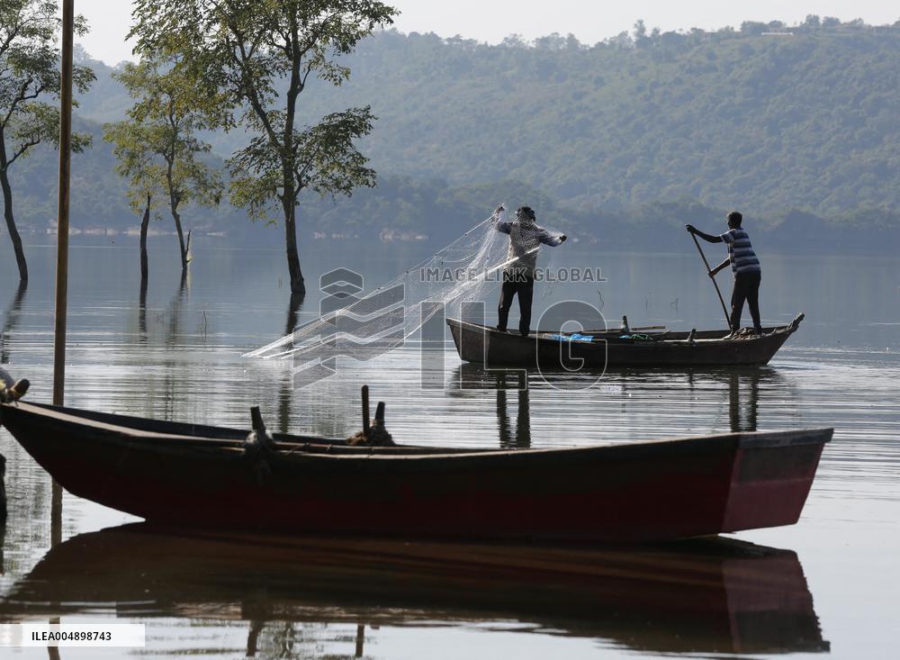 Fishermen in Phangota Lake - India