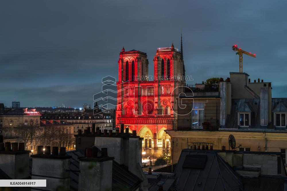 Notre Dame Lights Up In Red - Paris