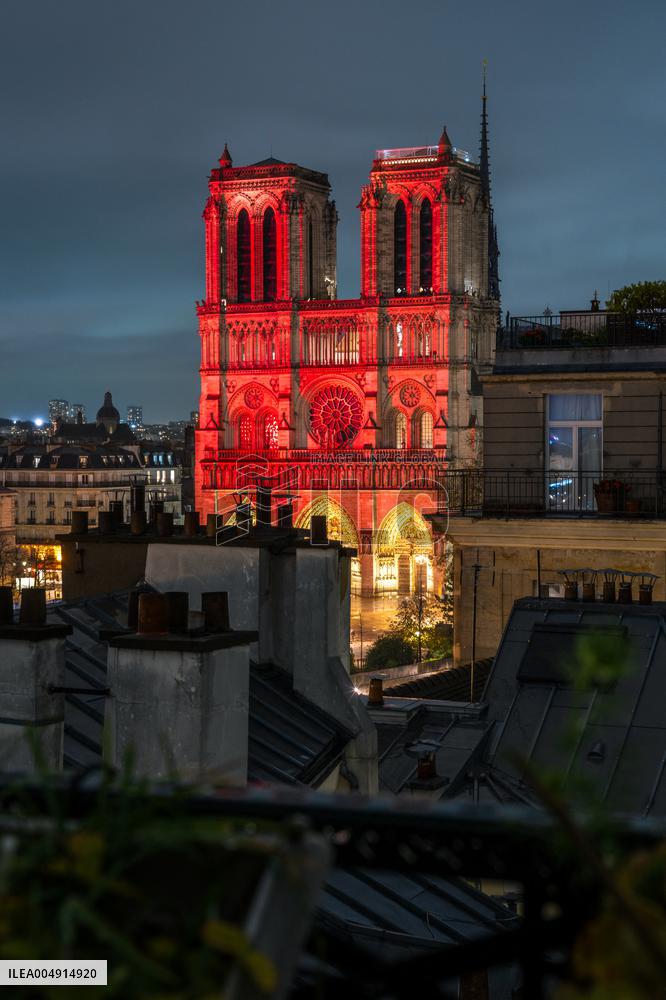 Notre Dame Lights Up In Red - Paris