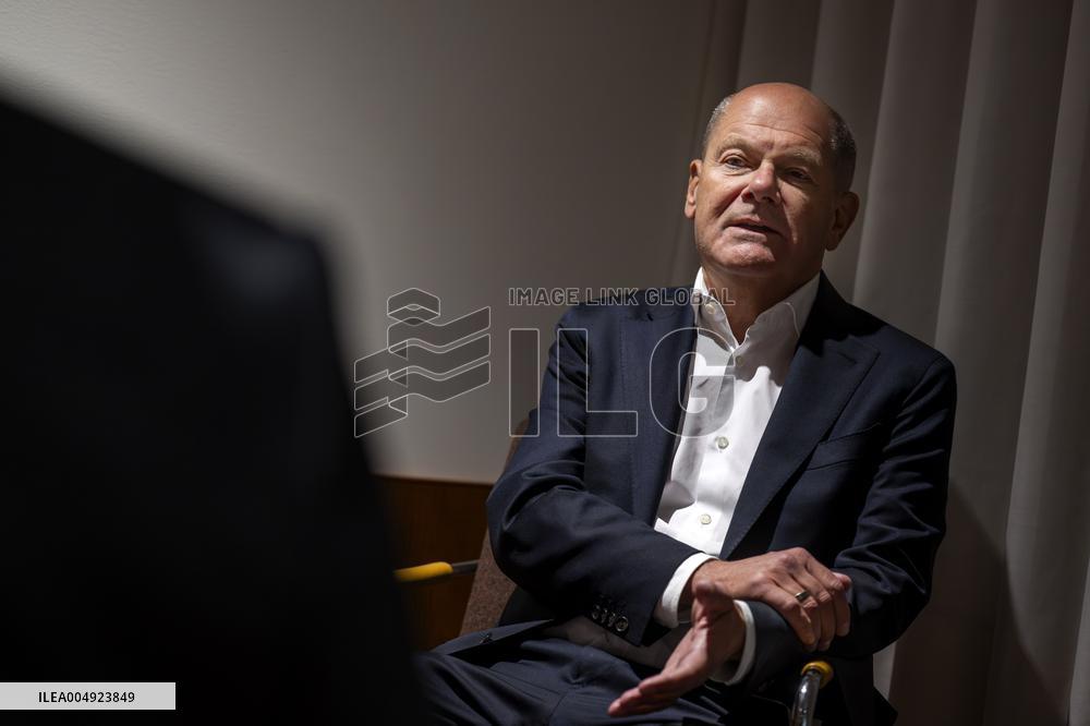 OLAF SCHOLZ