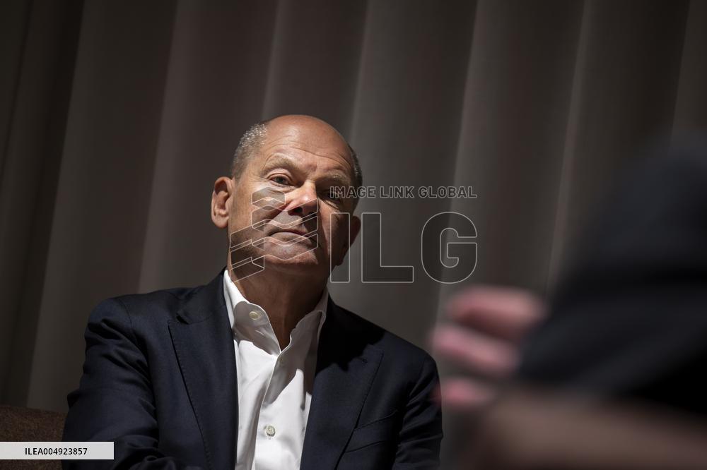 OLAF SCHOLZ