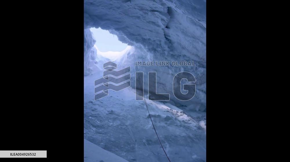China: Man Survives Night Trapped in Narrow Ice Crevasse in Chengdu