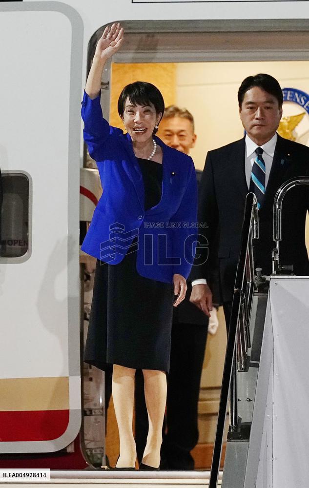 Japan PM Takaichi returns home