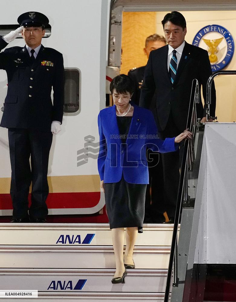 Japan PM Takaichi returns home