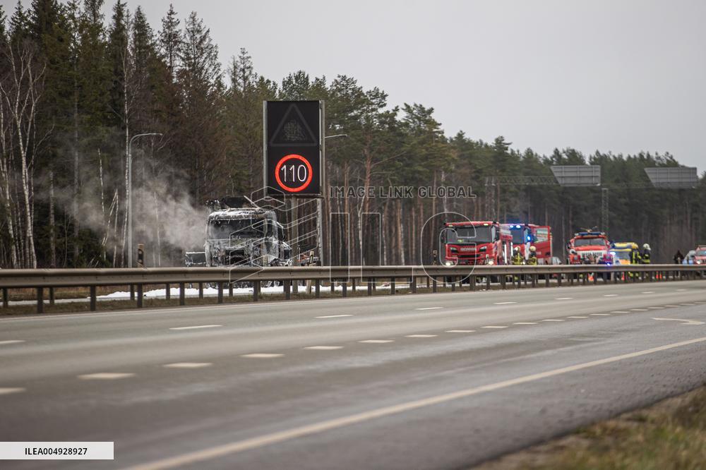Burning truck on motorway