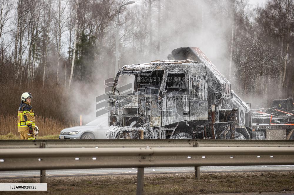 Burning truck on motorway