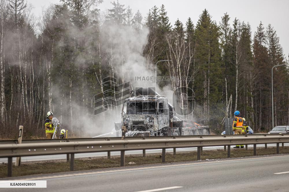 Burning truck on motorway