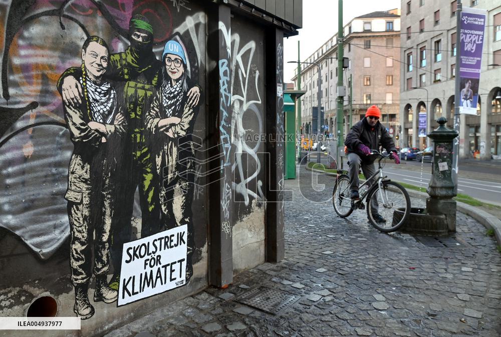 Provocative Wall Art Depicting Thunberg and Albanese with a Hamas Militant - Milan