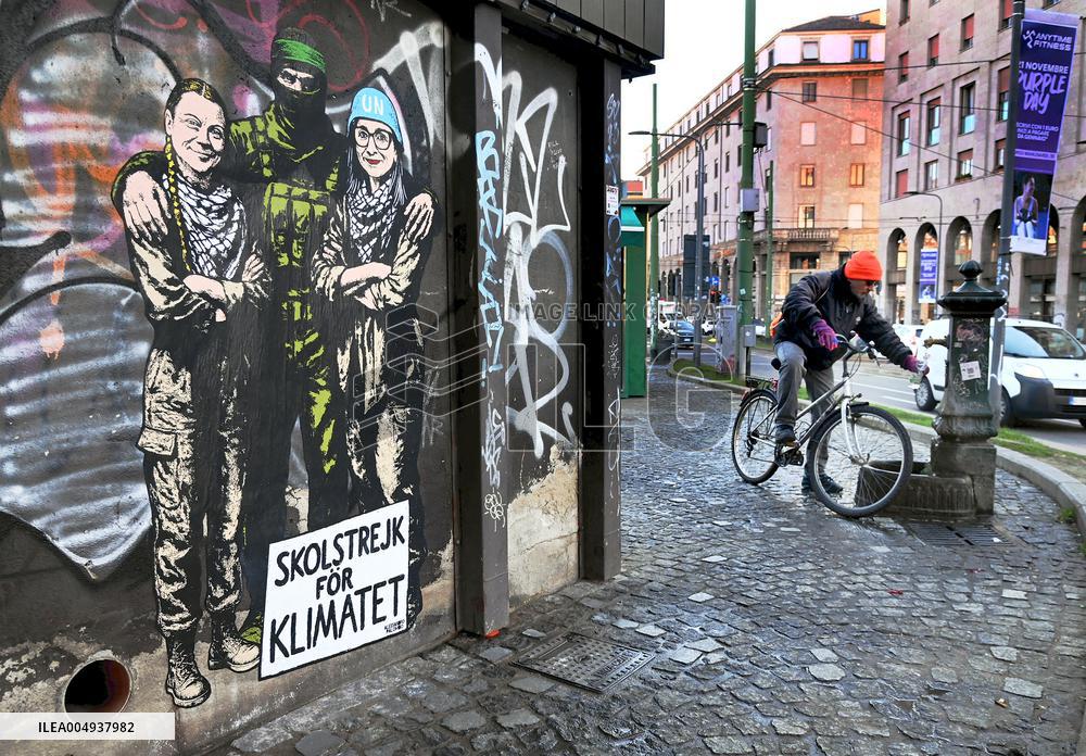 Provocative Wall Art Depicting Thunberg and Albanese with a Hamas Militant - Milan