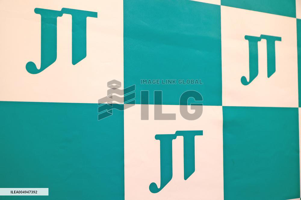 JT (Japan Tobacco Industries) signboard and logo