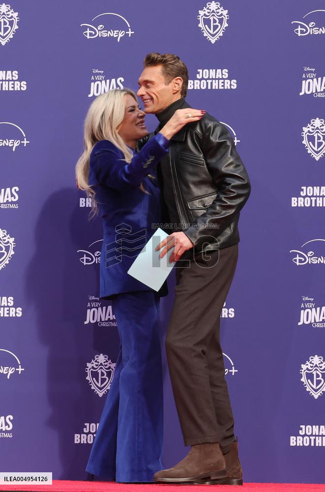 Jonas Brothers Hand And Footprint In Cement Ceremony - LA