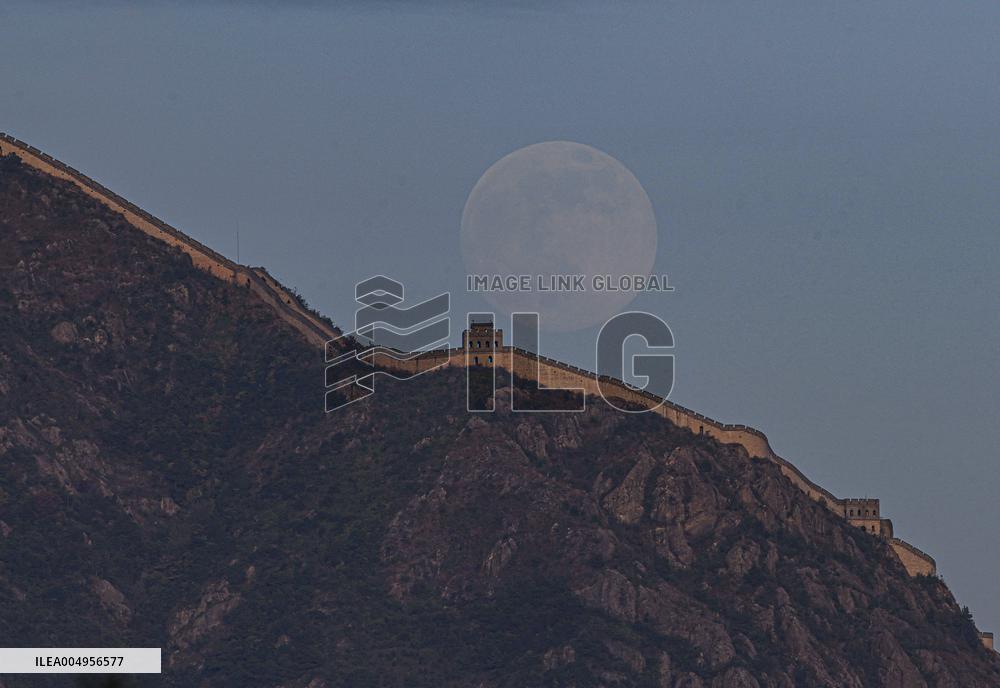 A Full Moon Over a Mountain - China