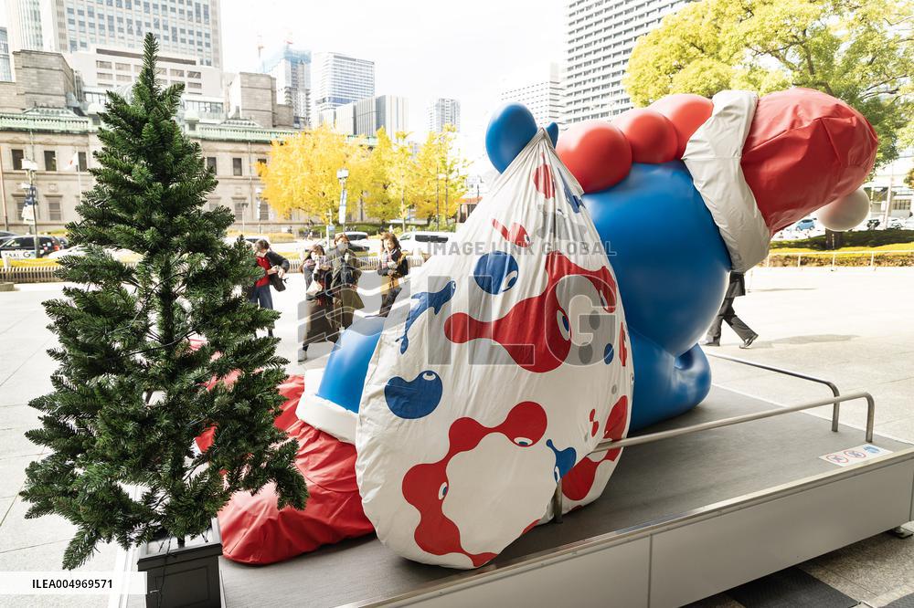 Myakumyak in a Santa Claus costume