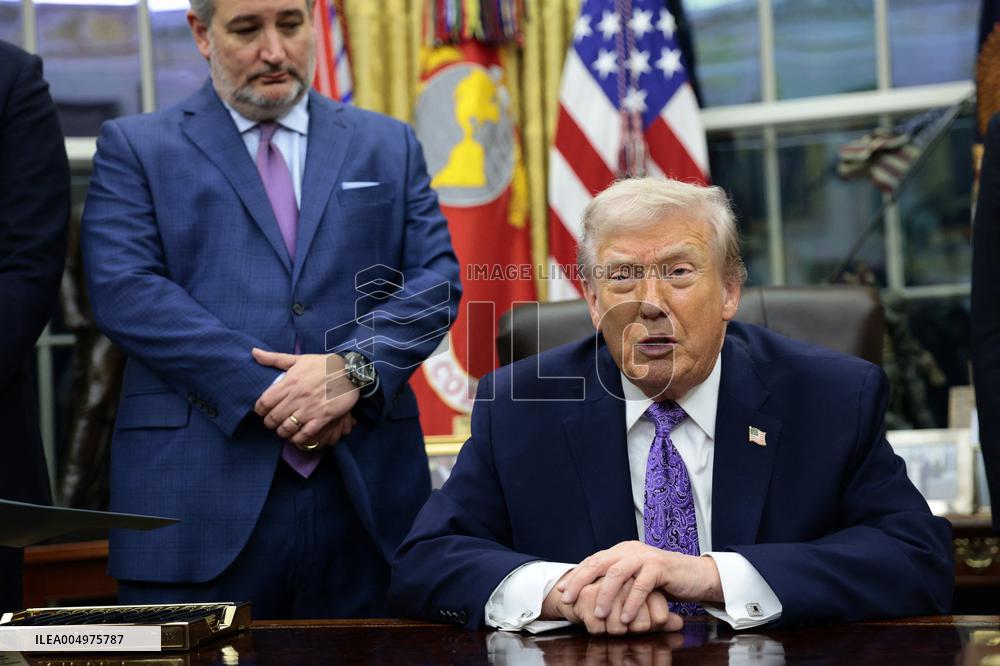 US President Donald J. Trump delivers remarks during a signing ceremony in the Oval Office