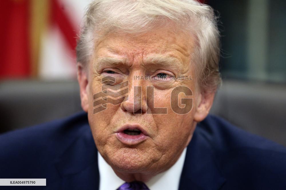 US President Donald J. Trump delivers remarks during a signing ceremony in the Oval Office