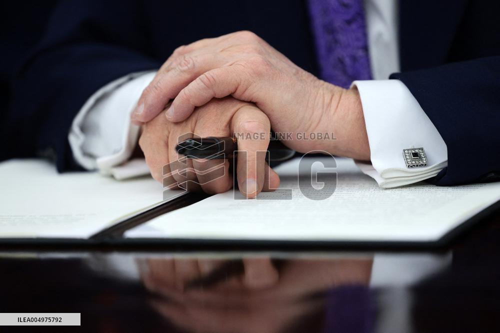 US President Donald J. Trump delivers remarks during a signing ceremony in the Oval Office